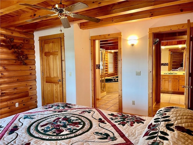 31 Table Rock Dr, Holiday Island, AR 72631 - bedroom featuring light tile patterned flooring, a wood ceiling with exposed beams, ensuite bathroom, and rustic walls