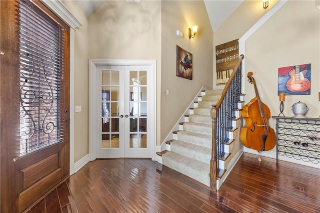 4130 Willowbend Dr, Rogers, AR 72758 - entryway with french doors, wood finished floors, stairs, and lofted ceiling