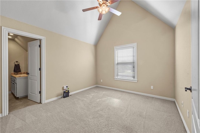 4130 Willowbend Dr, Rogers, AR 72758 - unfurnished bedroom with lofted ceiling, light carpet, a ceiling fan, and ensuite bathroom