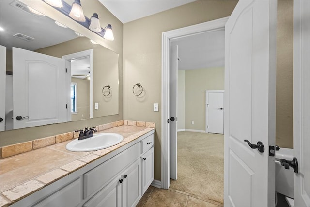 4130 Willowbend Dr, Rogers, AR 72758 - bathroom featuring vanity, ceiling fan, and tile patterned floors