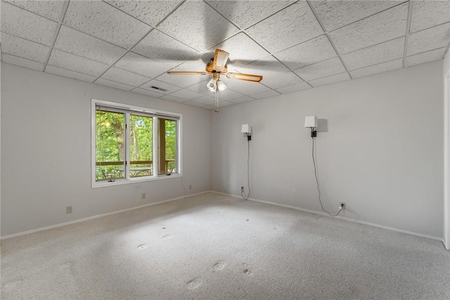 8394 Admiral Nimitz Dr, Rogers, AR 72756 - empty room featuring a ceiling fan, a drop ceiling, and carpet floors