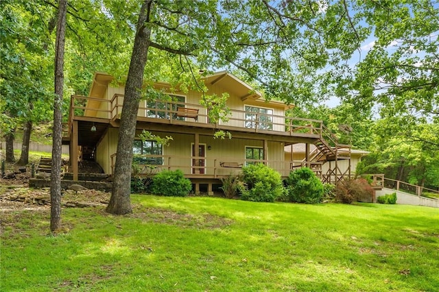 8394 Admiral Nimitz Dr, Rogers, AR 72756 - back of property featuring stairway, a deck, and a yard