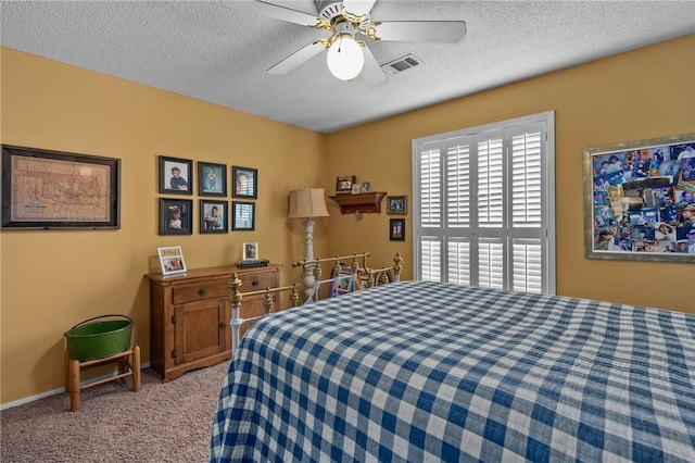 2105 Brookhaven Dr, Alma, AR 72921 - bedroom featuring a textured ceiling, carpet flooring, and ceiling fan