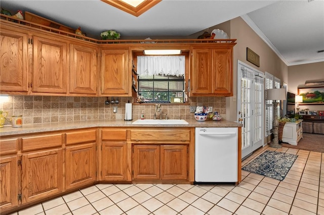 2105 Brookhaven Dr, Alma, AR 72921 - kitchen featuring dishwasher, crown molding, light tile patterned flooring, brown cabinetry, and backsplash