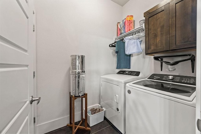1428 Allens Mill Way, Cave Springs, AR 72718 - washroom featuring cabinet space, washing machine and dryer, and dark tile patterned floors