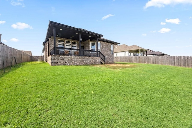 1428 Allens Mill Way, Cave Springs, AR 72718 - rear view of house featuring a fenced backyard, brick siding, and stairs