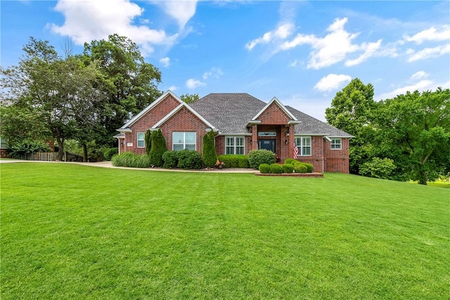 348 Whitcliff Dr, Cave Springs, AR 72718 - view of front of home featuring brick siding and a front yard