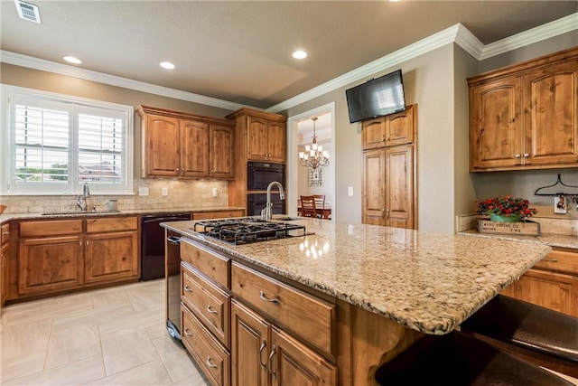 348 Whitcliff Dr, Cave Springs, AR 72718 - kitchen with black appliances, a chandelier, brown cabinets, light stone counters, and crown molding