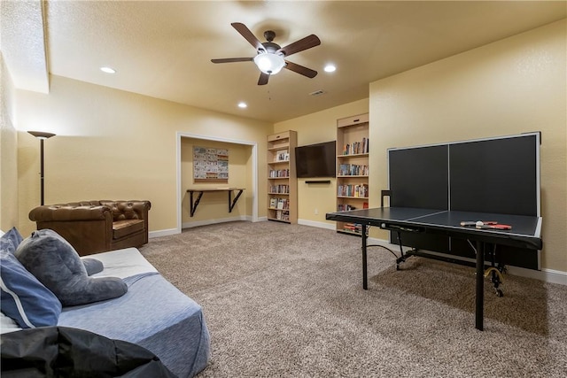 348 Whitcliff Dr, Cave Springs, AR 72718 - carpeted living room with a ceiling fan, built in features, and recessed lighting