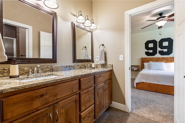 348 Whitcliff Dr, Cave Springs, AR 72718 - full bath featuring double vanity, ensuite bath, a ceiling fan, and tile patterned flooring