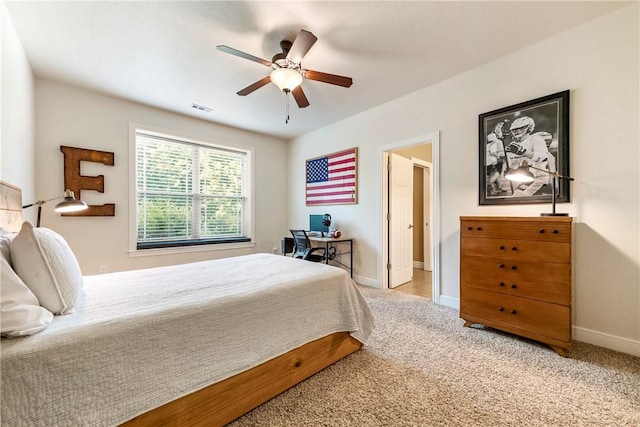 348 Whitcliff Dr, Cave Springs, AR 72718 - carpeted bedroom with baseboards and ceiling fan