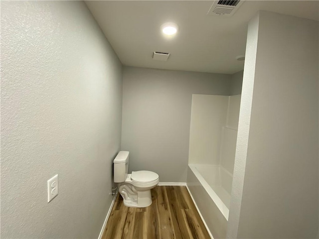 21 S Elizabeth St, Dover, AR 72837 - full bathroom featuring toilet and wood finished floors