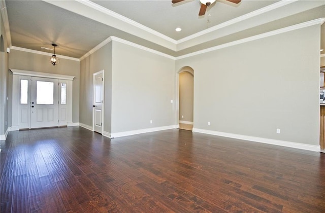 145 Rosemeade Dr, Farmington, AR 72730 - empty room featuring a ceiling fan, arched walkways, dark wood finished floors, and crown molding