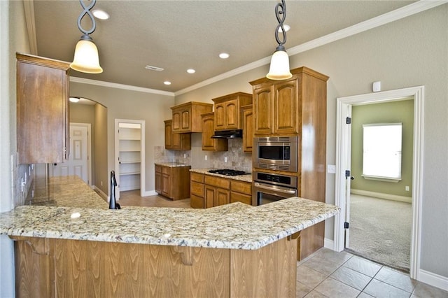 145 Rosemeade Dr, Farmington, AR 72730 - kitchen with appliances with stainless steel finishes, light tile patterned flooring, brown cabinets, a peninsula, and ornamental molding