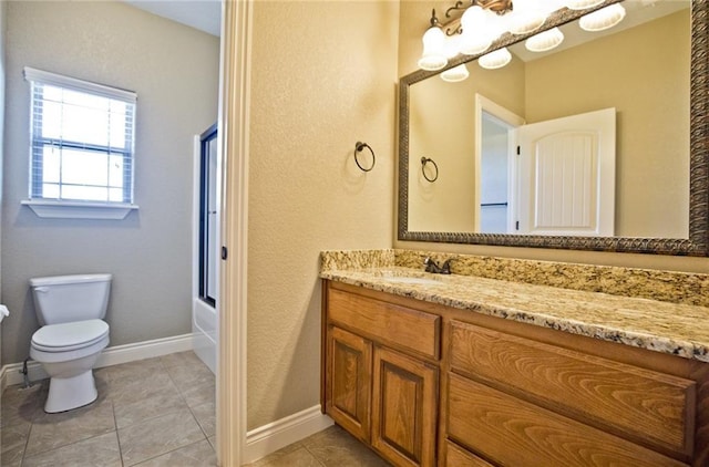 145 Rosemeade Dr, Farmington, AR 72730 - bathroom featuring vanity, shower / bath combination with glass door, a textured wall, and tile patterned floors