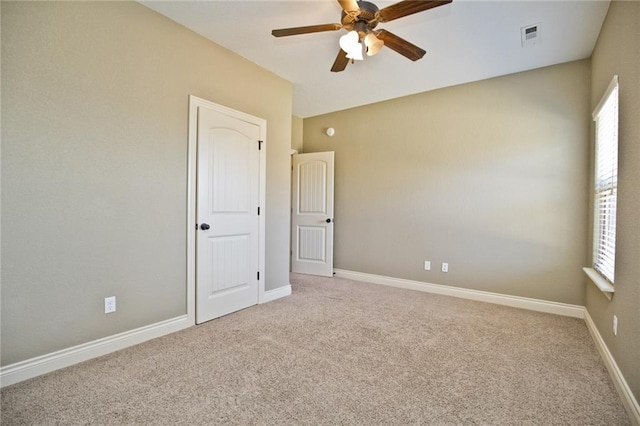 145 Rosemeade Dr, Farmington, AR 72730 - carpeted spare room featuring ceiling fan and baseboards