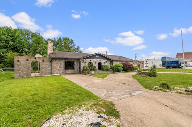 603 Thomas Blvd, Springdale, AR 72762 - single story home featuring a chimney and brick siding