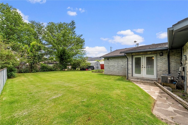 603 Thomas Blvd, Springdale, AR 72762 - view of yard with french doors