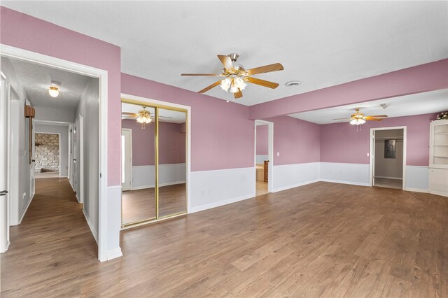 603 Thomas Blvd, Springdale, AR 72762 - spare room featuring a ceiling fan and wood finished floors
