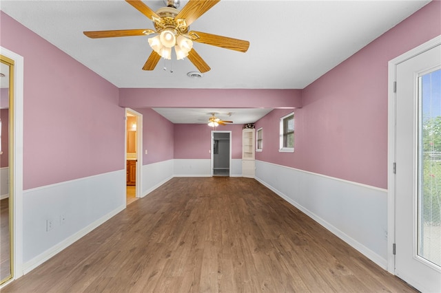 603 Thomas Blvd, Springdale, AR 72762 - unfurnished room featuring a ceiling fan and wood finished floors
