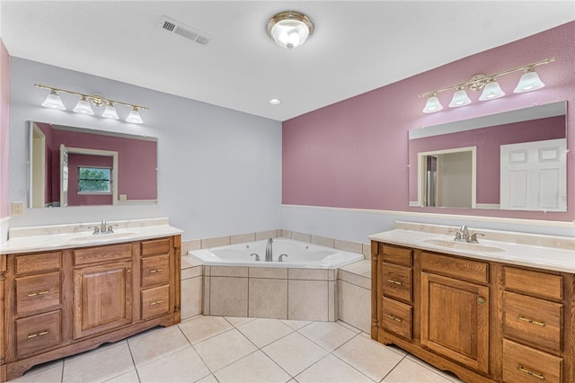 603 Thomas Blvd, Springdale, AR 72762 - full bathroom with two vanities, tile patterned floors, and a tub with jets