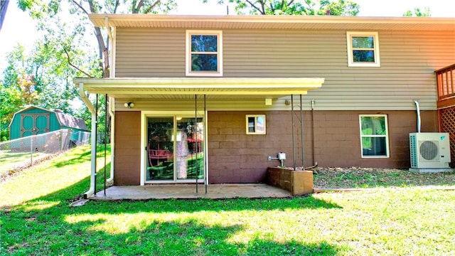 19135 Shoreline Way, Fayetteville, AR 72703 - back of house with a patio and a shed