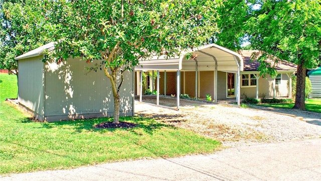 19135 Shoreline Way, Fayetteville, AR 72703 - view of front facade featuring driveway, a front lawn, and a carport