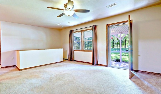 19135 Shoreline Way, Fayetteville, AR 72703 - spare room featuring light colored carpet and a ceiling fan