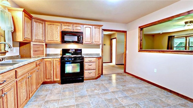 19135 Shoreline Way, Fayetteville, AR 72703 - kitchen with black appliances, light countertops, and a ceiling fan
