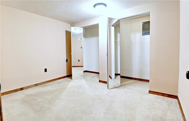 19135 Shoreline Way, Fayetteville, AR 72703 - unfurnished bedroom with carpet, a textured ceiling, and a closet