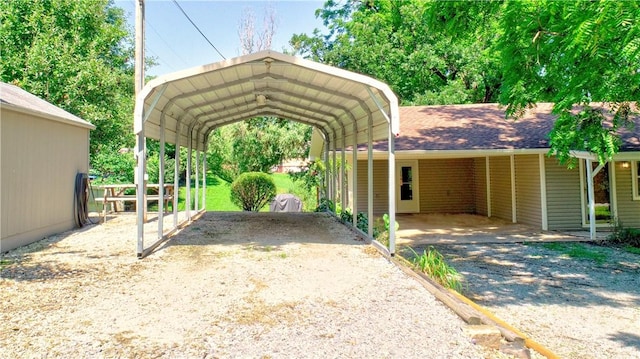 19135 Shoreline Way, Fayetteville, AR 72703 - view of vehicle parking featuring driveway and a carport
