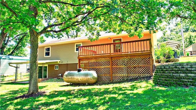 19135 Shoreline Way, Fayetteville, AR 72703 - rear view of house featuring a lawn and a wooden deck