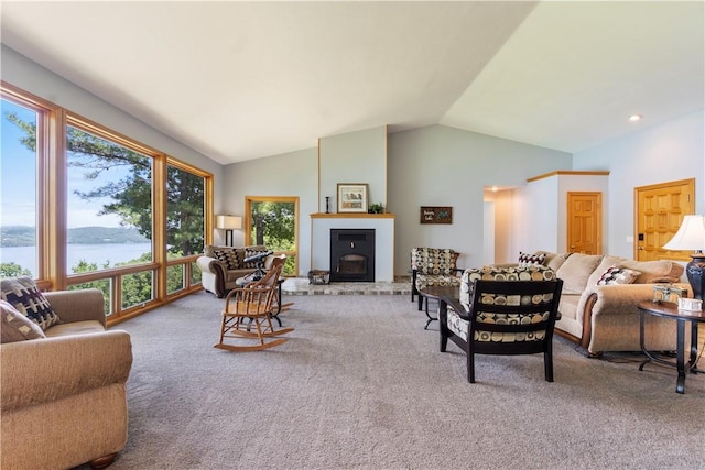 188 Point Mirage Rd, Eureka Springs, AR 72631 - carpeted living area with vaulted ceiling, a water view, and a fireplace