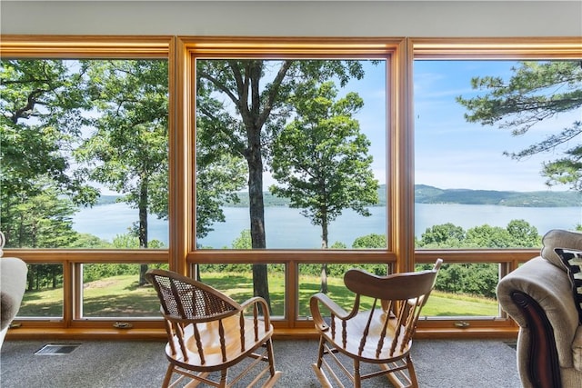 188 Point Mirage Rd, Eureka Springs, AR 72631 - sunroom / solarium with a water view and healthy amount of natural light