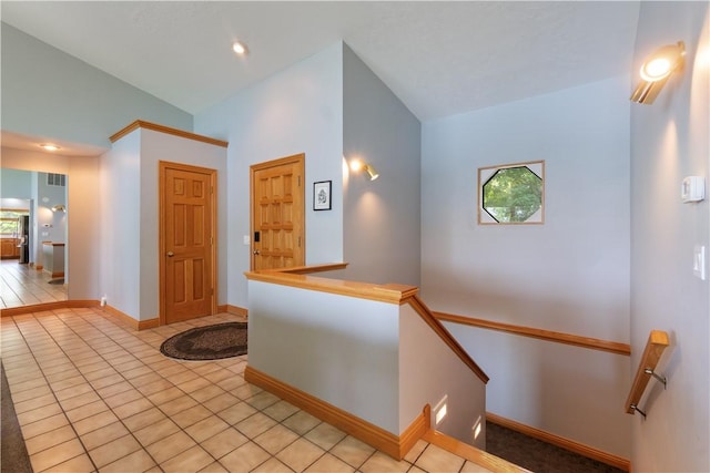 188 Point Mirage Rd, Eureka Springs, AR 72631 - hallway with an upstairs landing, lofted ceiling, and light tile patterned floors