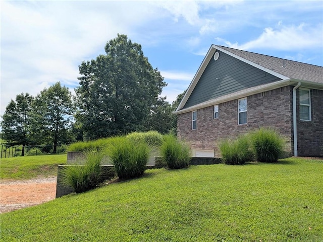 1445 Woodhaven Ln, Harrison, AR 72601 - view of property exterior featuring a yard and brick siding