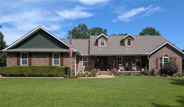 1445 Woodhaven Ln, Harrison, AR 72601 - view of front of home with a porch, a front yard, a shingled roof, and brick siding