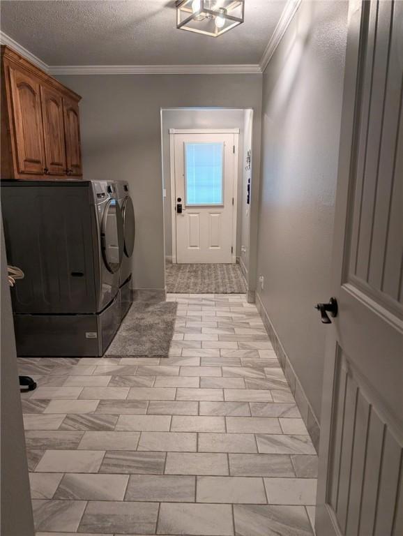 1445 Woodhaven Ln, Harrison, AR 72601 - laundry area with independent washer and dryer, cabinet space, and crown molding