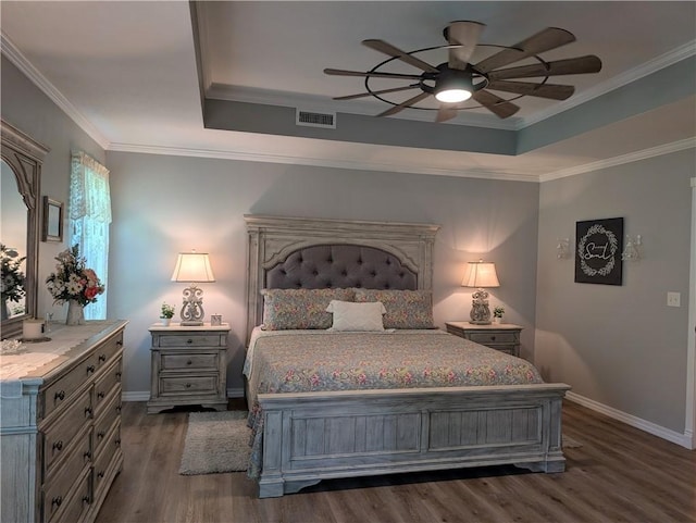1445 Woodhaven Ln, Harrison, AR 72601 - bedroom featuring wood finished floors, a raised ceiling, a ceiling fan, and crown molding