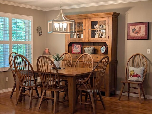 1445 Woodhaven Ln, Harrison, AR 72601 - dining area with wood finished floors, plenty of natural light, a chandelier, and ornamental molding