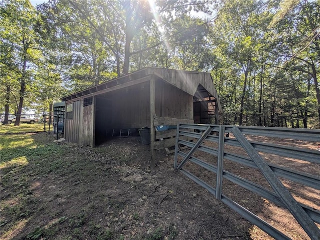1445 Woodhaven Ln, Harrison, AR 72601 - view of outbuilding featuring a detached carport and an exterior structure