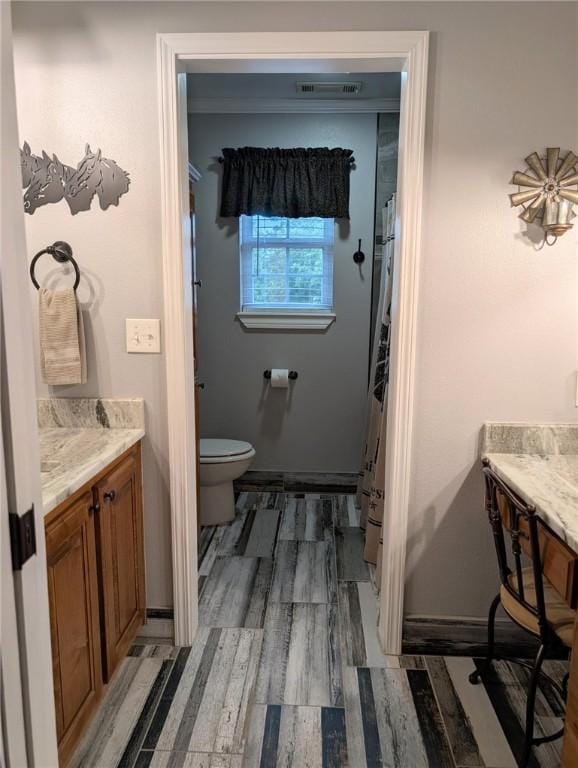 1445 Woodhaven Ln, Harrison, AR 72601 - bathroom with vanity, wood finished floors, and curtained shower