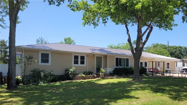 400 Franklin St, Harrison, AR 72601 - ranch-style home with a front yard, a metal roof, and a patio area