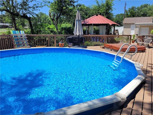 400 Franklin St, Harrison, AR 72601 - outdoor pool with a wooden deck, a gazebo, and grilling area