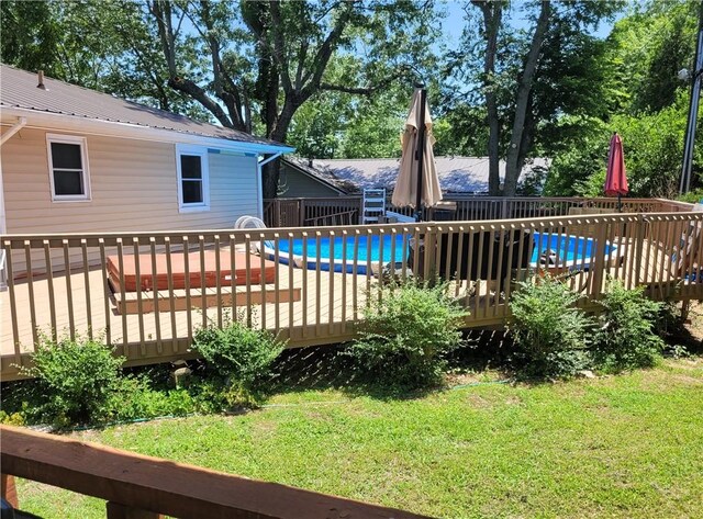 400 Franklin St, Harrison, AR 72601 - view of swimming pool featuring a deck and a lawn