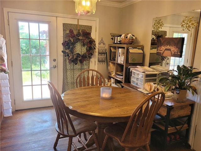 400 Franklin St, Harrison, AR 72601 - dining room with crown molding, healthy amount of natural light, wood finished floors, and a chandelier