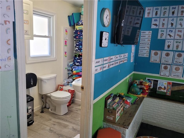 400 Franklin St, Harrison, AR 72601 - bathroom with wood finished floors and toilet