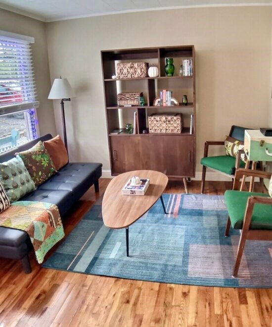 151 W Van Buren, Eureka Springs, AR 72632 - living room featuring wood finished floors and ornamental molding