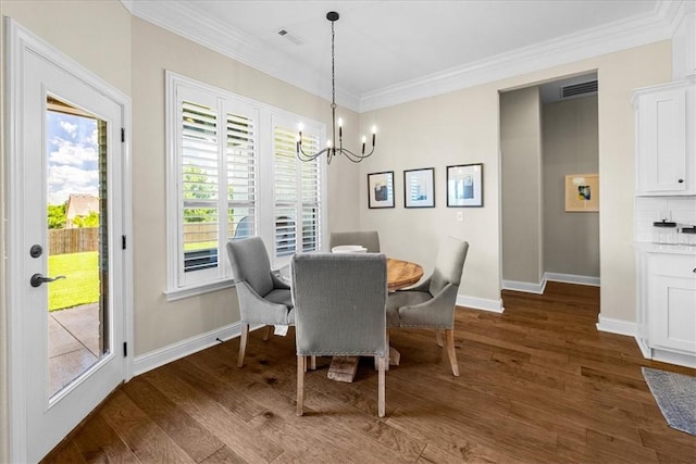 1200 Birkshire Cir, Cave Springs, AR 72718 - dining area with a chandelier, crown molding, and dark wood-type flooring