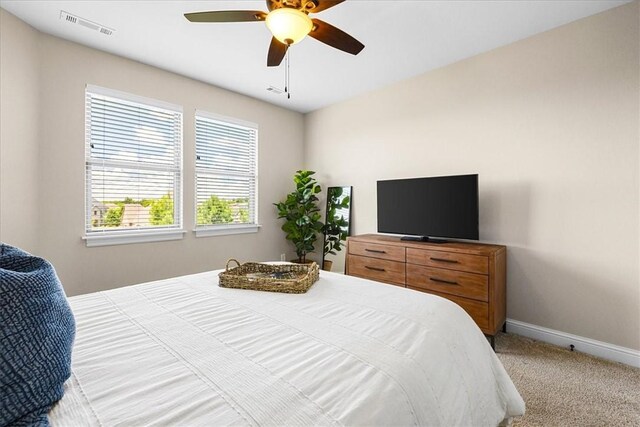 1200 Birkshire Cir, Cave Springs, AR 72718 - carpeted bedroom with baseboards and a ceiling fan